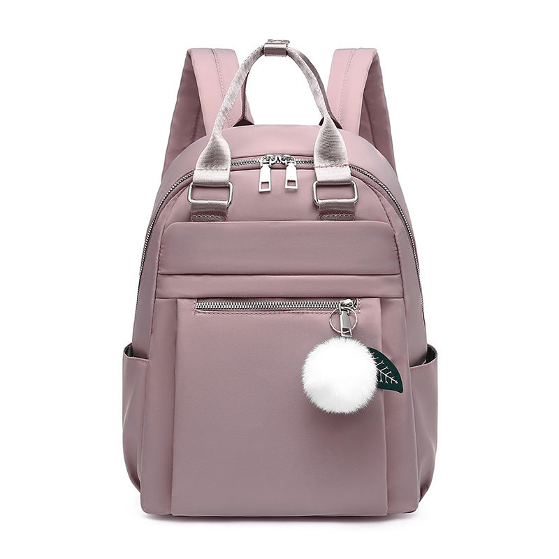Sac à dos collégien avec pompon blanc